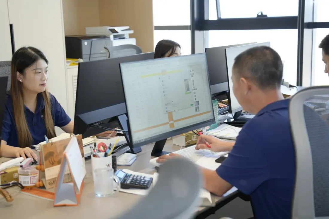 Order team reviewing export and delivery documents
