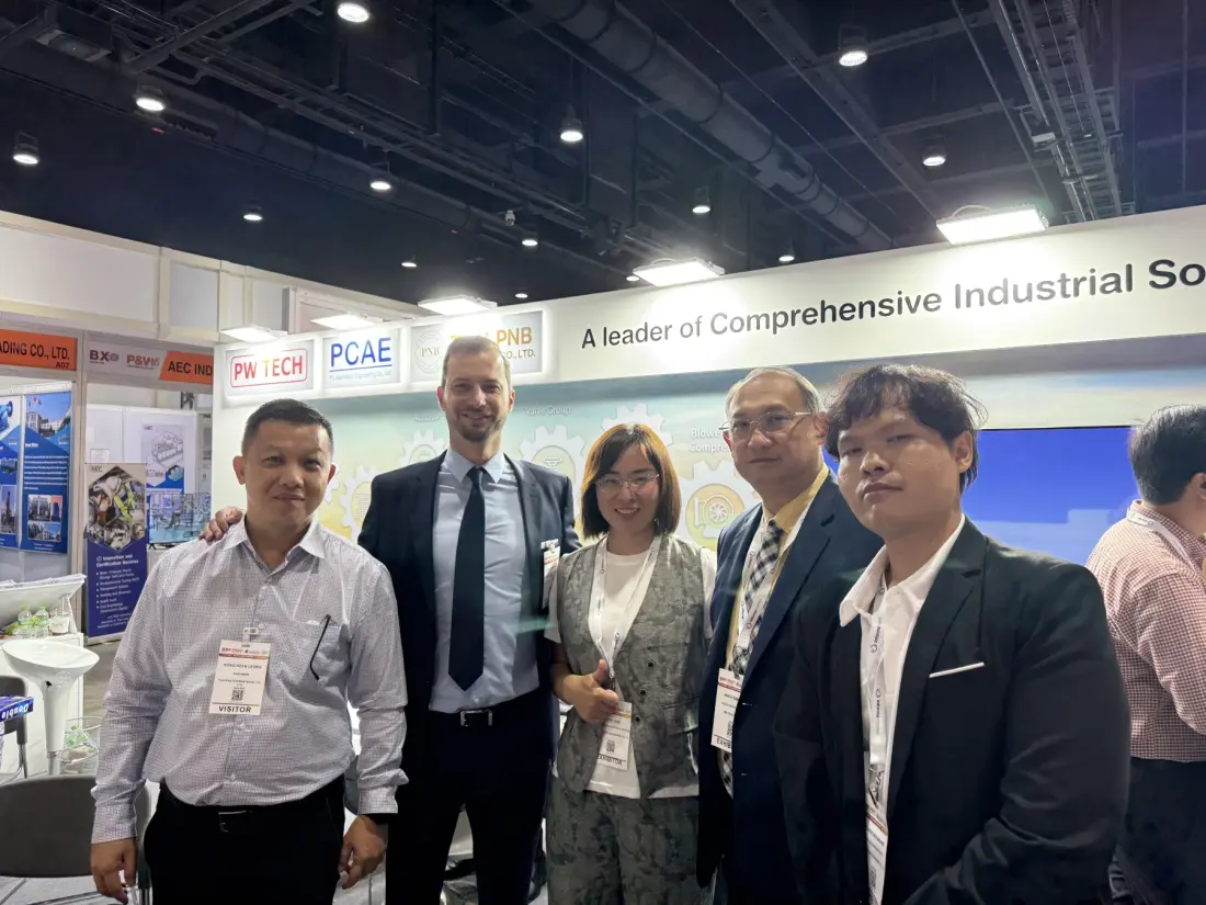 Sales team and customers at an industrial trade show
